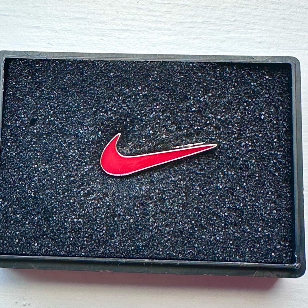Red Nike Swoosh hat pin